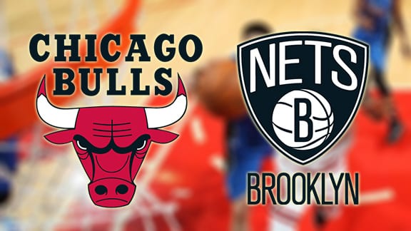 chicago bulls logo and brooklyn nets logo on picture of NBA game